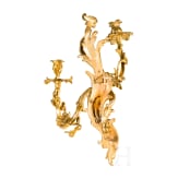 A German or French pair of fire gilt Louis XV sconces, mid-18th century