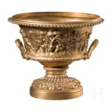 A centerpiece with putti frieze, France, probably late 19th century, cast brass with gilt-coloured finish