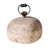 A German stone weight of nine pounds with iron handle, 17th century