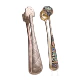 A trompe l'oeil sugar tong and a cloisonn&eacute;-enamel sugar tong, Russia, St. Petersburg, Grachev, 1886 / Moscow, 1908&ndash;1917