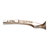 A silver sugar tongs and six spoons, Russia, 1865-1908