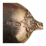 Twelve silver partial-gilt tea spoons and a sugar tong with a case, stamped Russia, circa 1880