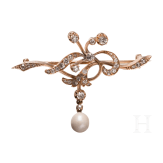 A Russian 14ct gold and diamond flower-shaped brooch