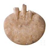 An alabaster disc decorated with incised patterns, a fragment of an Early Bronze Age idol, Cappadocia, late 3rd millennium B.C.