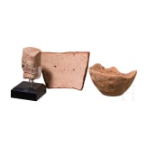 Two fragments of ancient Egyptian pottery and a clay head in Egyptian style from the eastern Mediterranean region, ca. 1350 B.C. &ndash; 6th century B.C.