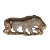 Bronze appliqu&eacute; depicting a big cat holding a snake in its paws, 4th century B.C.