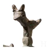 Bronze oil lamp on a disc-shaped base with floral and figurative decoration, Seljuk, 12th&ndash;13th centuries