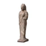 Ointment jar in the shape of a girl with a dove, from southern Italy, modeled after an Eastern Greek design, circa 500 B.C.