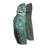 Two anatomically shaped greaves with dotted-and-knobbed decoration, from southern Italy, 5th&ndash;4th centuries B.C.