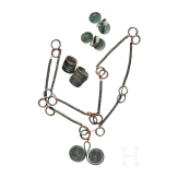 A set of Bronze Age jewellery, strung in modern times, together with two finger rings and two curl rings, 10th&ndash;9th centuries B.C.