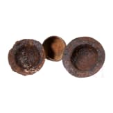 Two iron shield bosses and an iron cladding, 6th century A.D.