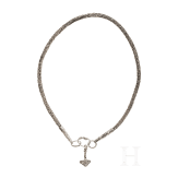 Ornate Thor&rsquo;s hammer on a solid silver foxtail chain, Viking, 10th century.