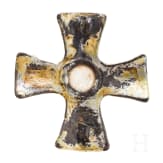 A brooch made of gold-plated silver in the shape of a cross, depicting Odin and his ravens, Viking, 10th century.