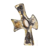 A brooch made of gold-plated silver in the shape of a cross, depicting Odin and his ravens, Viking, 10th century.