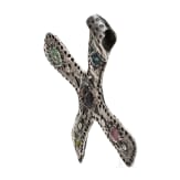 A silver cross-shaped pendant with punched decoration and inlays, Viking, 10th century.