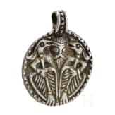 Round silver pendant depicting Thor with Hugin and Munin, 10th century.