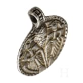 Round silver pendant depicting Thor with Hugin and Munin, 10th century.