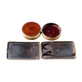 A damascene iron card case and a circular lacquer box, Japan, first half of the 20th century