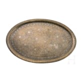 An oval tray with chased d&eacute;cor, India, Lahore, 19th century