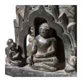 Bronze votive stupa with a reliquary chamber and depictions of Shakyamuni Buddha, flanked by two worshippers. Pagan Kingdom (Myanmar), 12th &ndash; 13th centuries.