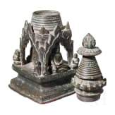 Bronze votive stupa with a reliquary chamber and depictions of Shakyamuni Buddha, flanked by two worshippers. Pagan Kingdom (Myanmar), 12th &ndash; 13th centuries.