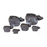 Nine rhino-shaped bronze opium weights, Burma, 20th century