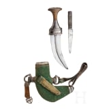 A silver mounted Oman jambiya with rhino horn hilt, ca. 1900