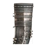 A Yemenite silver-mounted jambiya with rhino horn grip, dated 1942