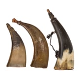 Three German horn powder flasks, mid-18th century