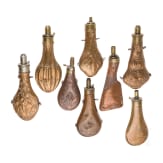 Eight copper powder flasks, three times C&J.W. Hawksley in Sheffield, second half of the 19th century