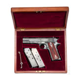 A Colt Government Model, engraved, in case