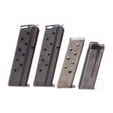 Four magazines (Colt Government, Savage 1907, Mauser HSc)