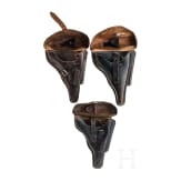 Three Luger holsters