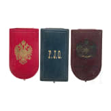 Three empty award cases, circa 1900