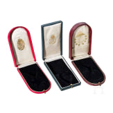 Three empty award cases, circa 1900