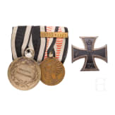 Two-piece colonial medal buckle and an Iron Cross, 1st Class, 1914