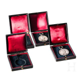 Two silver commemorative medals marking the 25th anniversary of King Charles's reign in 1889 and two cases