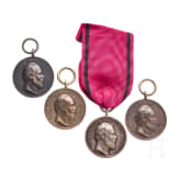 Four silver King Karl Civil Service Medals