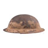 A MK I &ldquo;Brodie&rdquo; steel helmet, an early production model with an additional rail for the face guard