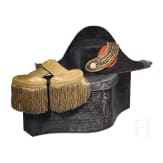 A bicorne hat and a pair of epaulettes for naval officers, circa 1900