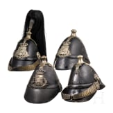 Four fragmentary M 1848 helmets of the Landwehr infantry