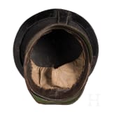 Two fragmentary helmets M 1868 and a shako body, 19th century