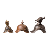 Sechs preu&szlig;ische Miniaturhelme, um 1900
