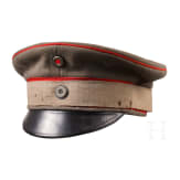 A field-grey visor cap for officers of the Prussian army with camouflage ribbon