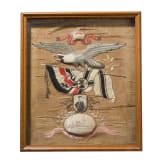 A Chinese silk embroidery picture and a wooden eagle, 1st half 20th century
