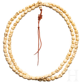A Tibetan skull necklace, circa 1900