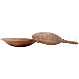 A wooden bowl and a dancepaddle, Papua New Guinae