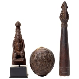 A decorated coconut, a small sculpture and a ceremonial sceptre, Papua New Guinea