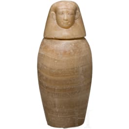 An Egyptian canopic jar with Imseti lid, 26th dynasty, 664 - 525 B.C.
