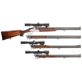 A Winkler, Ferlach, over/under combination rifle, with three barrel sets